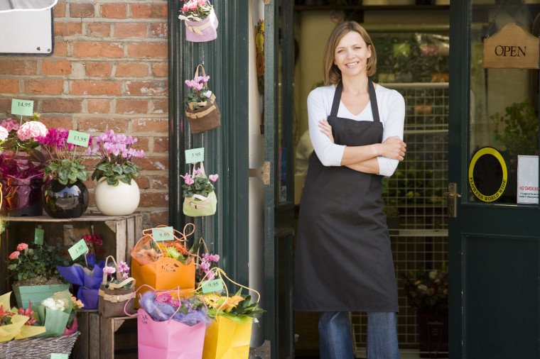 Woman Outside Flower Shop